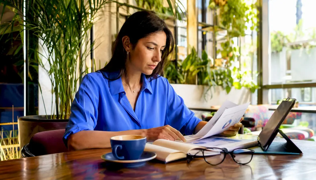 Event planner reviewing bar cost budgets