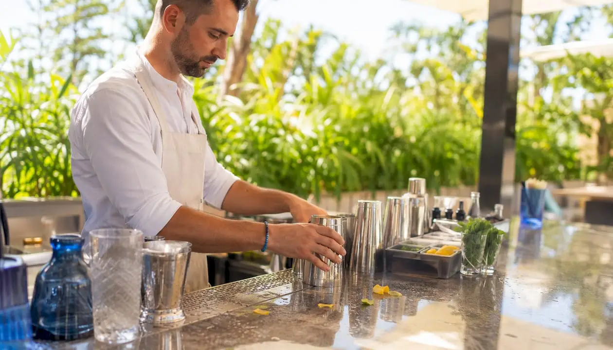 Close-up bartending tools on mobile bar setup
