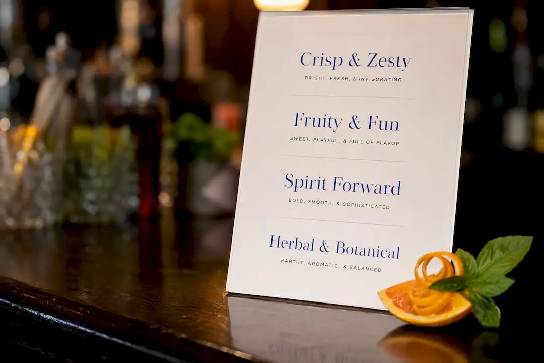 Creative cocktail category names on event menu