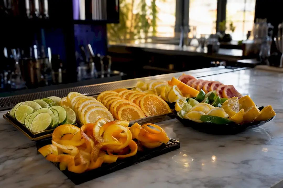 Assorted citrus cocktail garnishes on counter