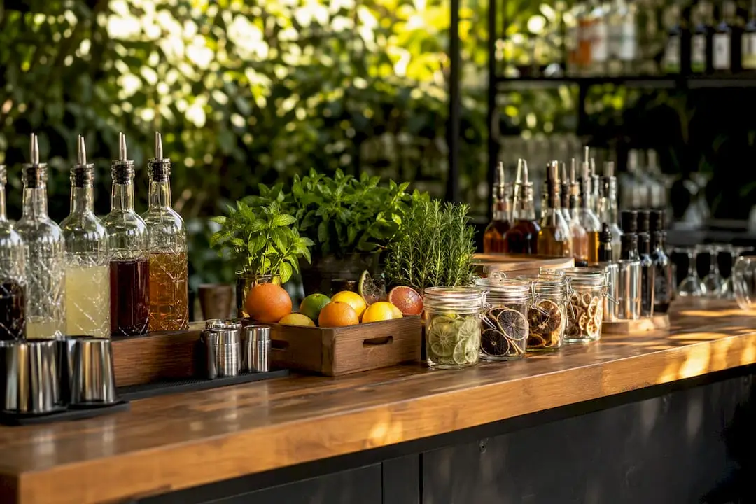 Vegan cocktail preparation station with labeled bottles