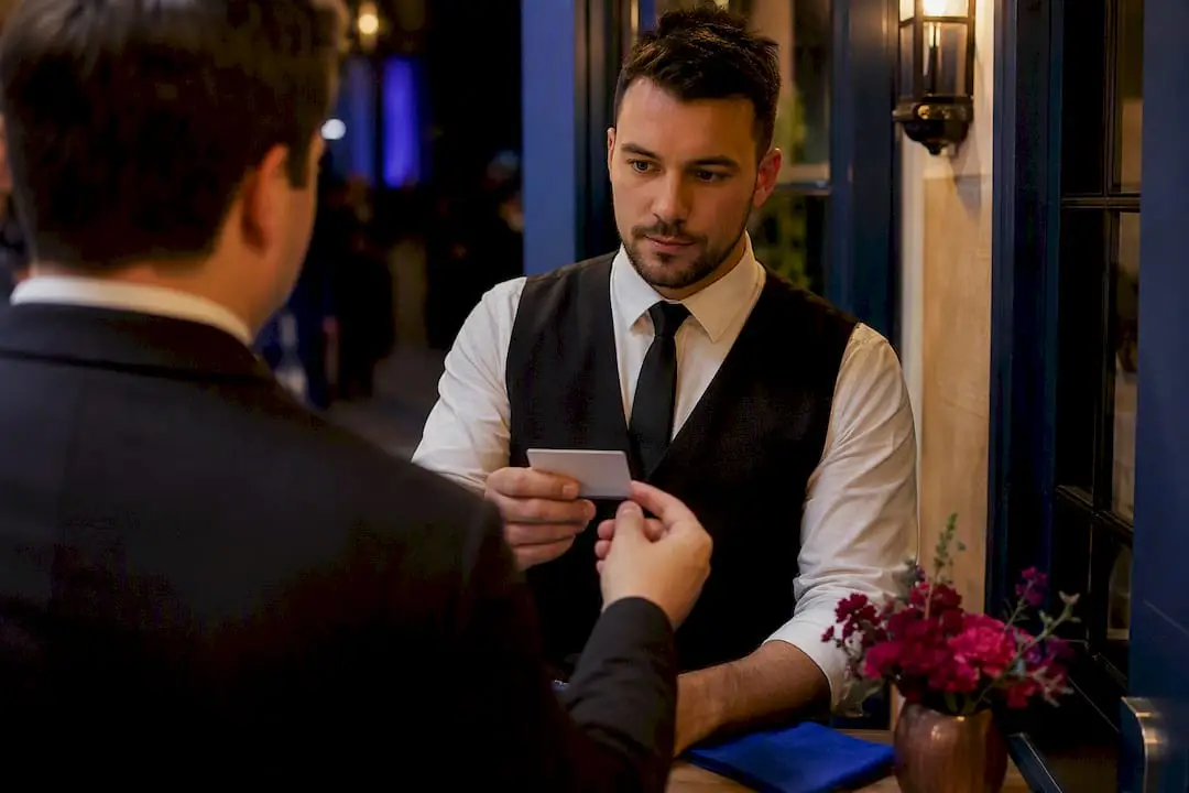 Bartender discreetly checking a guest identification