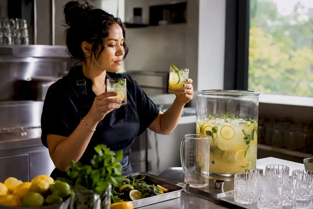 Bartender testing batched signature mocktails